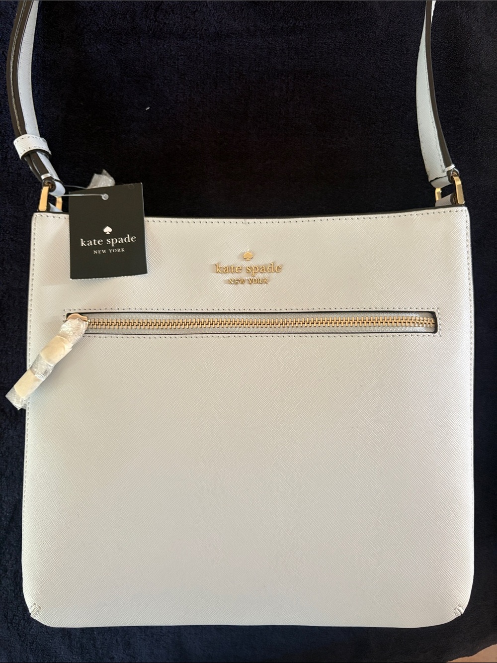 kate spade cream leather crossbody with gold hardware 10” high 9” wide